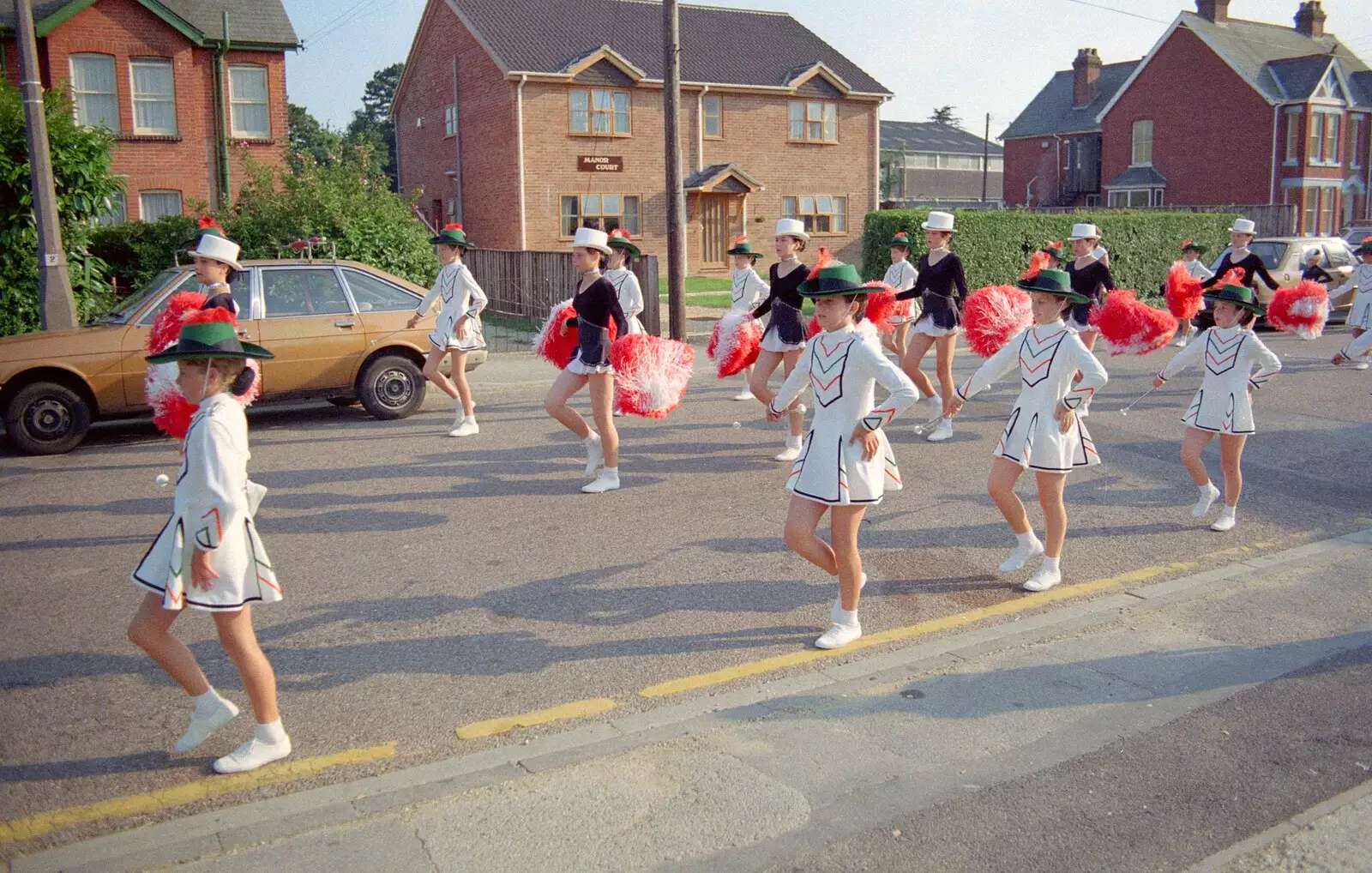 Majorettes march up Manor Road, from Sean and the New Milton Carnival, Hampshire - 1st August 1986