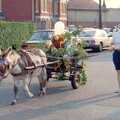A small donkey pulls a cart dressed as a tree, Sean and the New Milton Carnival, Hampshire - 1st August 1986