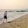 Sean walks up the beach with his sword in hand, McCarthy and Stone and the Bournemouth Carnival, Dorset - 8th August 1986