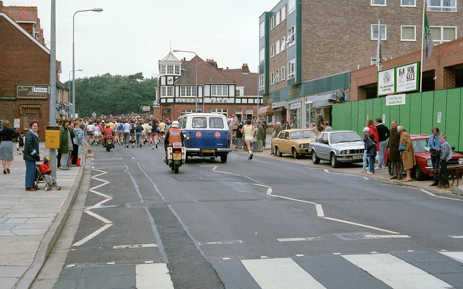 The runners, support van and a motorbike rozzer from The New Forest Marathon, New Milton, Hampshire - 14th September 1986