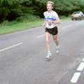 A marathon runner legs it through Brockenhurst, The New Forest Marathon, New Milton, Hampshire - 14th September 1986