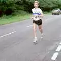 A marathon runner legs it through Brockenhurst, The New Forest Marathon, New Milton, Hampshire - 14th September 1986