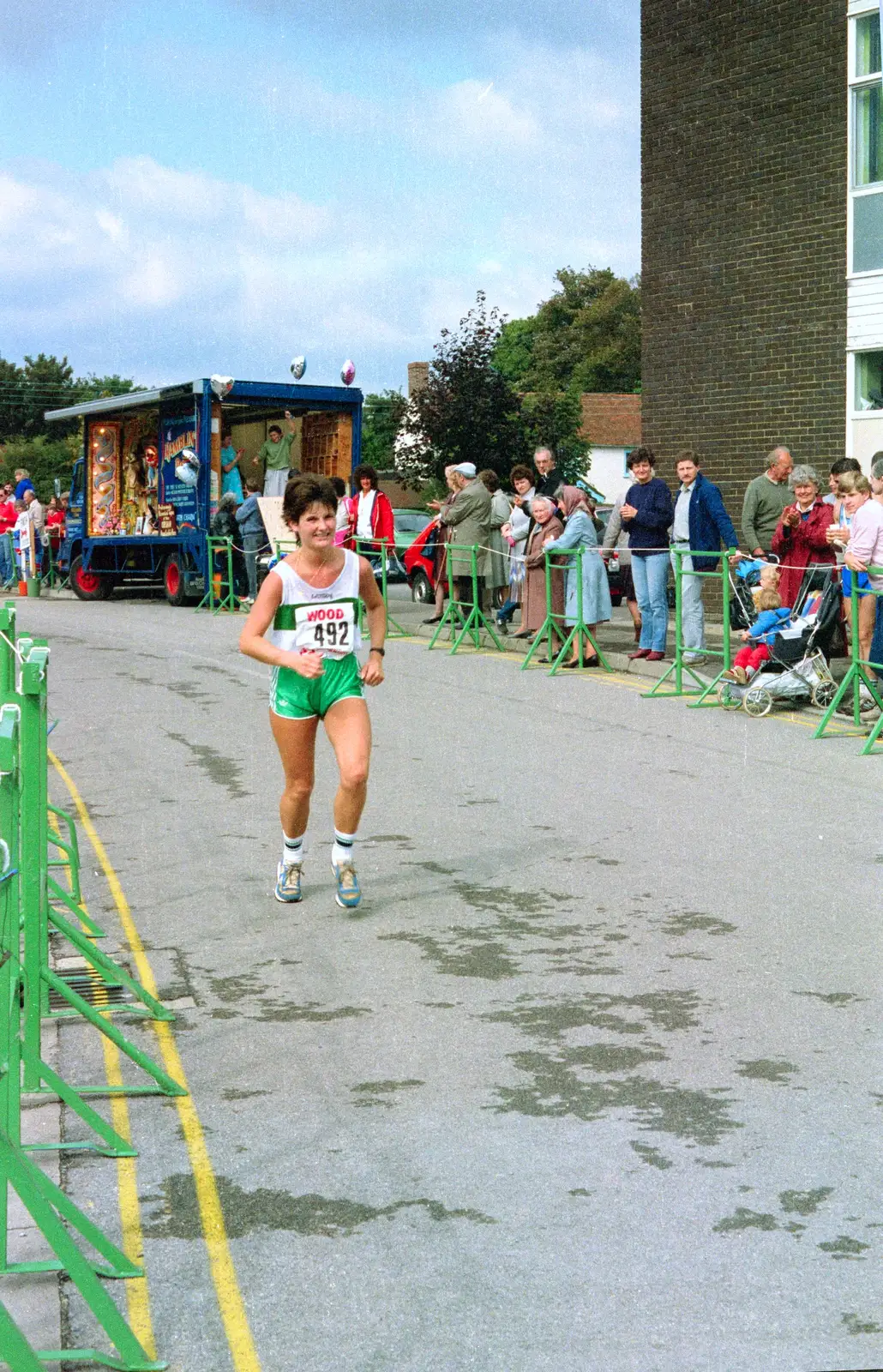A runner passes the SCOLA building  at Arnewood School, from The New Forest Marathon, New Milton, Hampshire - 14th September 1986