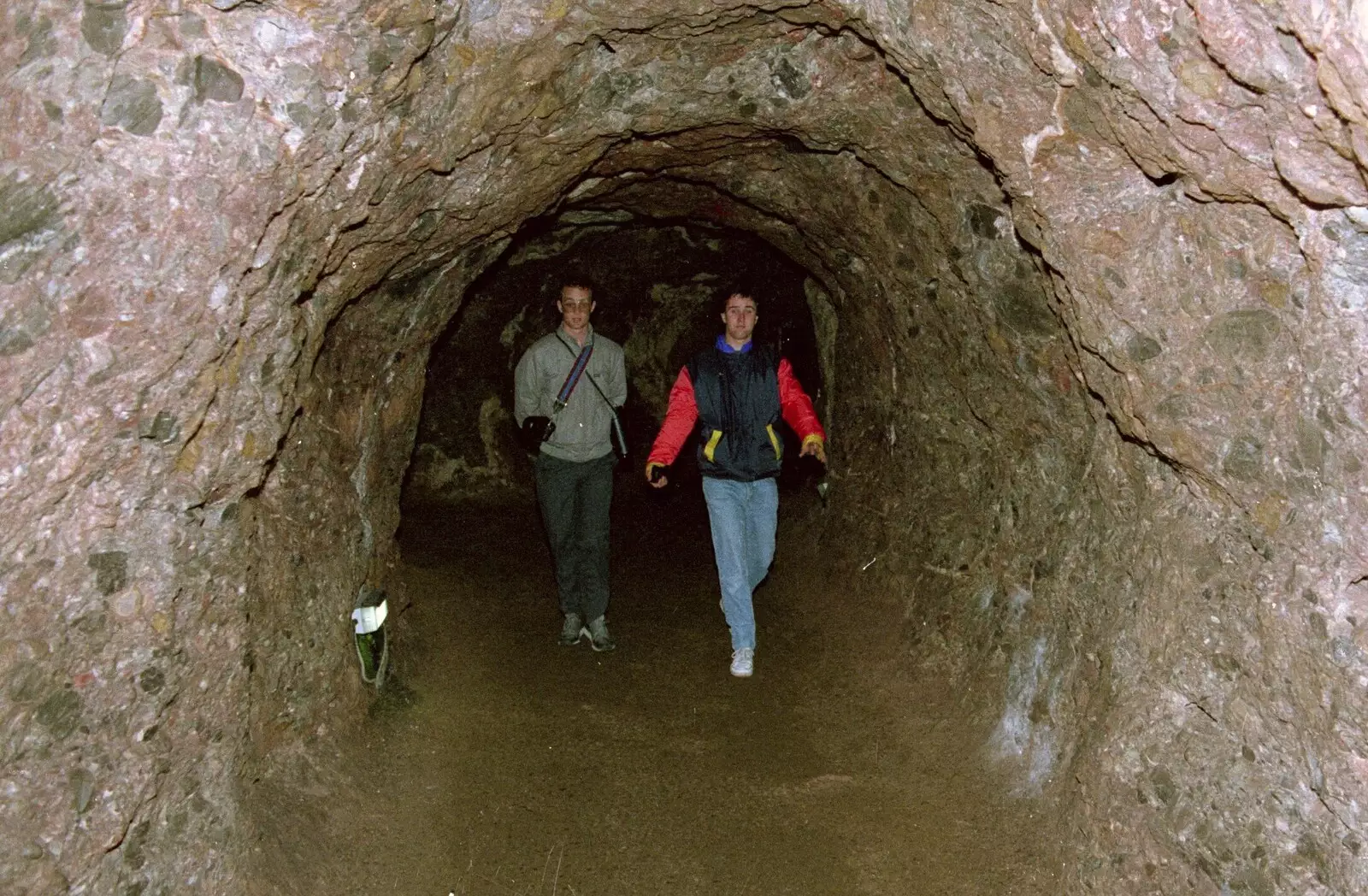 Chris and Riki stroll through a tunnel, from Uni: Back at Poly and a Trip to Cheddar Gorge, Somerset and Plymouth - 2nd October 1986