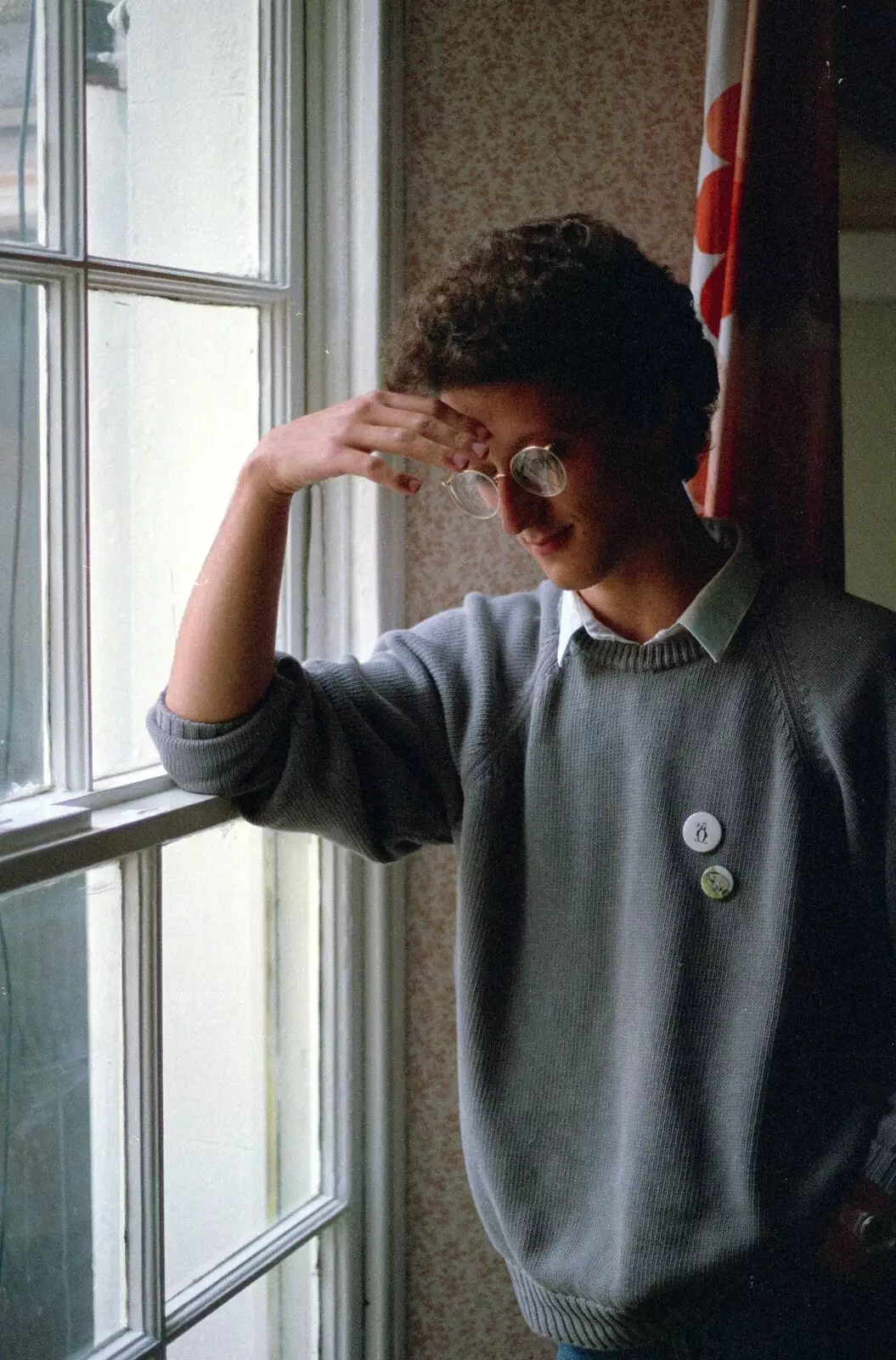 Dave's mate Christos Zarakovitis looks moody by a window, from Uni: A Plymouth Hoe Kickabout, Plymouth, Devon - 20th October 1986