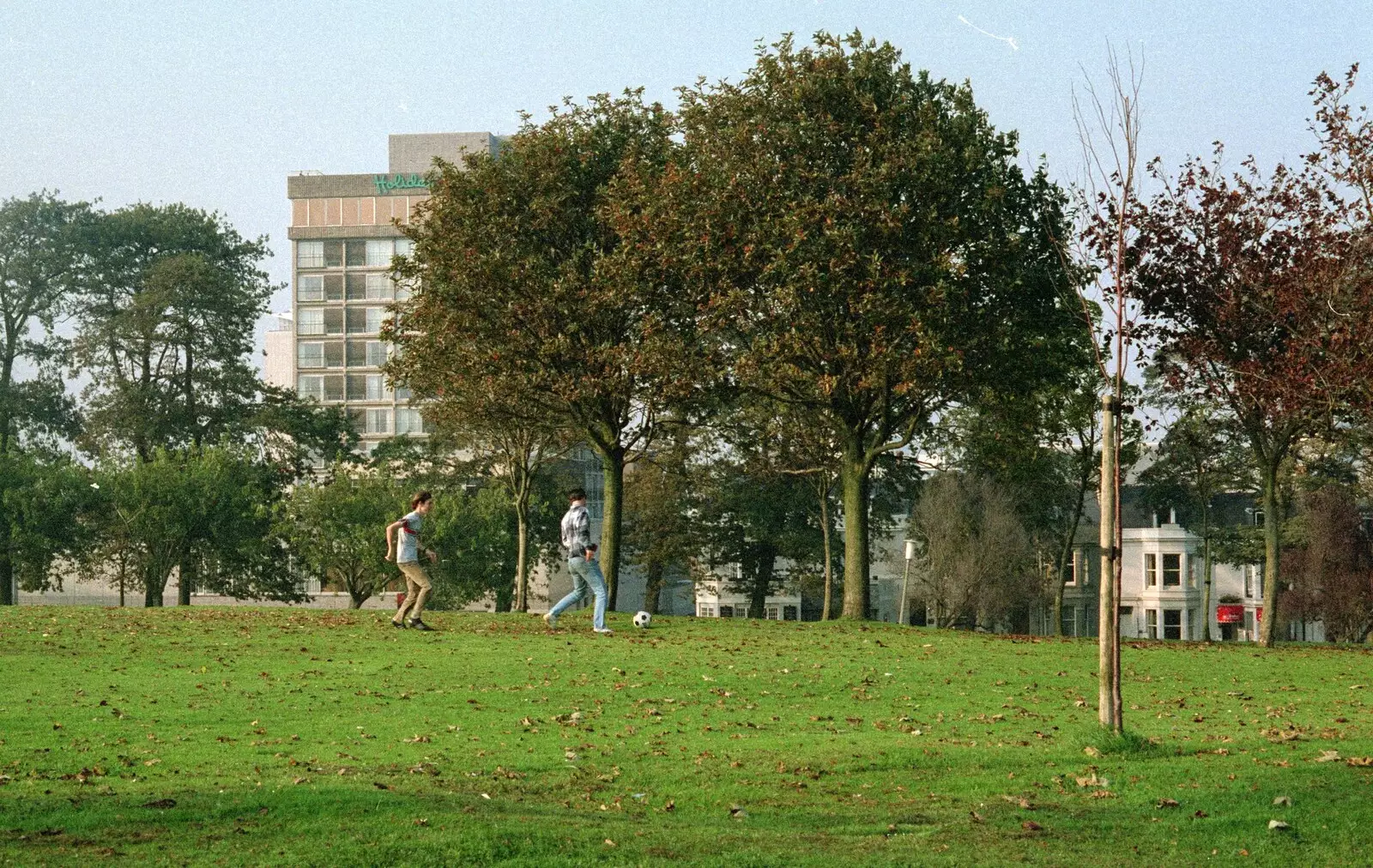 Dave and Riki kick about in the park behind the Holiday Inn, from Uni: A Plymouth Hoe Kickabout, Plymouth, Devon - 20th October 1986