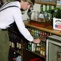 A bottle of Satique is selected by the barman, Uni: The Plymouth Polytechnic Satique Project, Salcombe and Plymouth - 10th November 1986
