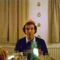Mike contemplates the wine pouring, Christmas with Neil and Caroline, Burton, Dorset - 25th December 1986
