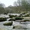 Riki and Andy sit on the rocks and watch the river, Uni: A Trip to Venford Resevoir, Dartmoor, Devon - 18th January 1987