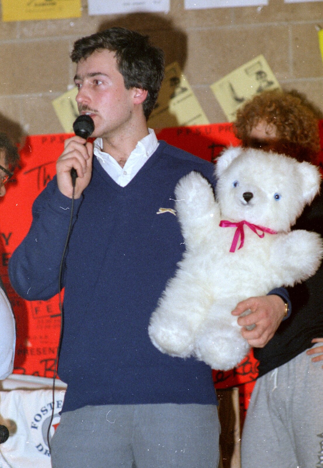 Mark Wilkins auctions off a stuffed teddy from Uni: Pirate RAG Bash, Games Nights and Brian's Beard, PPSU, Plymouth - 10th February 1987