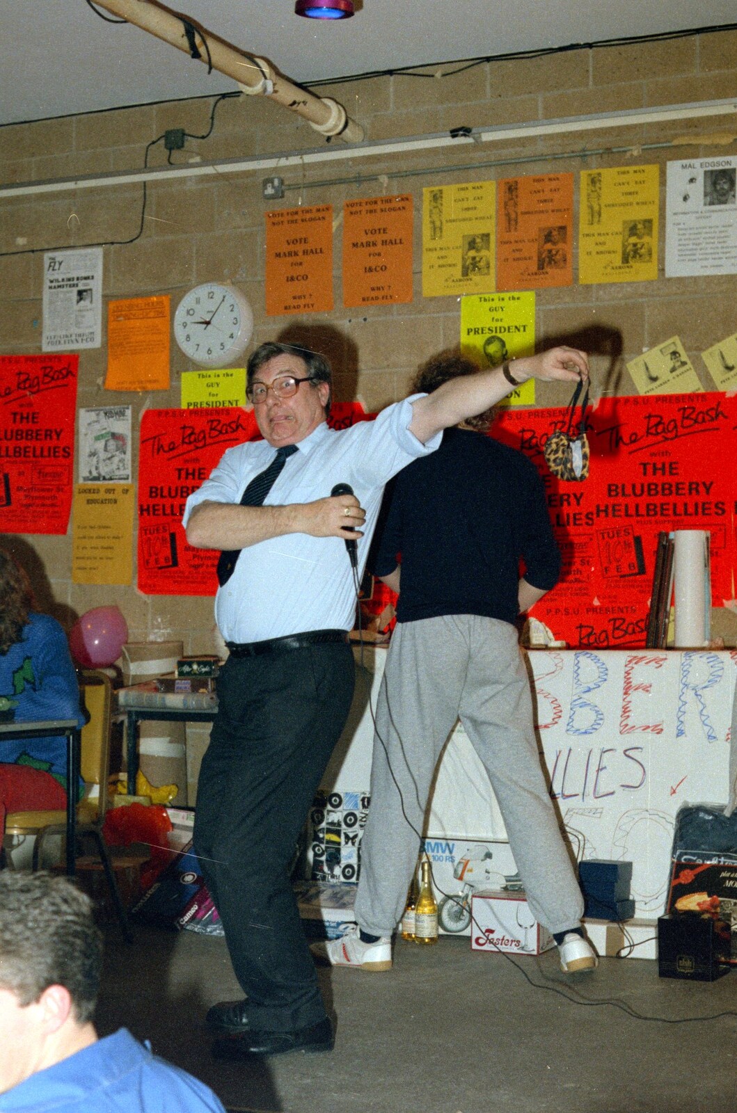 Roy Gardner dangles something from a safe distance from Uni: Pirate RAG Bash, Games Nights and Brian's Beard, PPSU, Plymouth - 10th February 1987