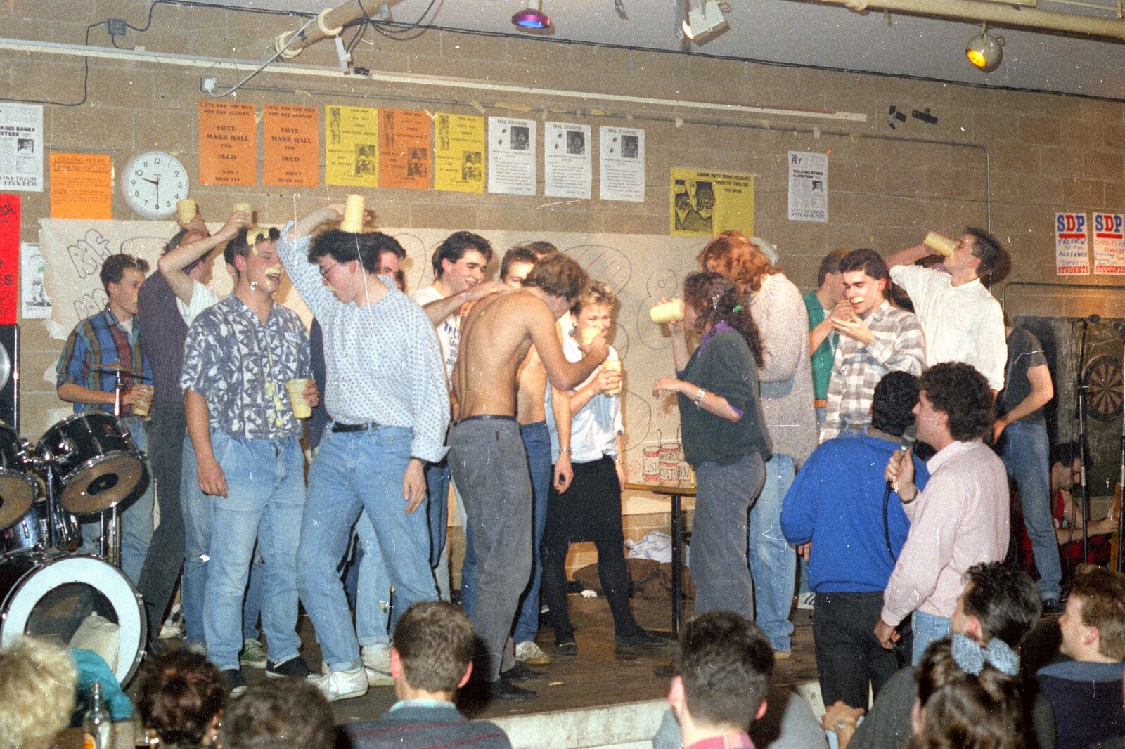 Tim Collins puts his mostly-empty glass on his head from Uni: The Pirate RAG Review, PPSU Students' Union, Plymouth - 11th February 1987