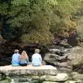 Three girls sit on the old bridge at Badger's Holt, A Trip to Trotsky's Mount, Dartmoor, Devon - 20th March 1987