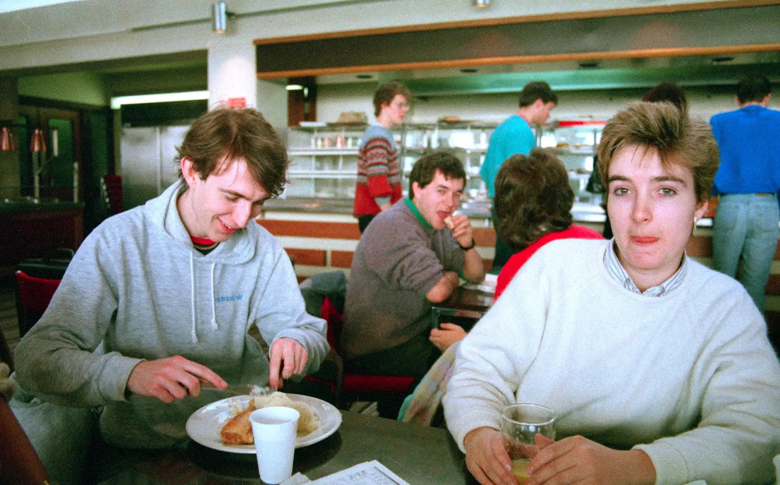 Dave tries to eat his lunch in the GTB canteen, from Uni: Scenes from the PPSU Bar, Plymouth, Devon - 2nd April 1987