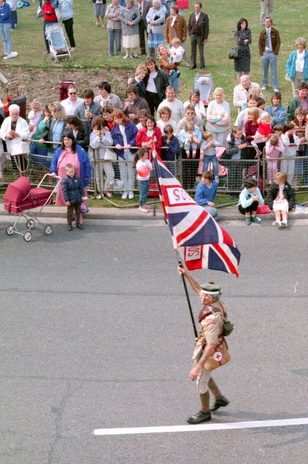 A flag bearer brings up the rear of the parade, from Chantal and Andy's Wedding, and the Lord Mayor's Parade, Plymouth - 20th May 1987