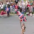 A flag bearer brings up the rear of the parade, Chantal and Andy's Wedding, and the Lord Mayor's Parade, Plymouth - 20th May 1987