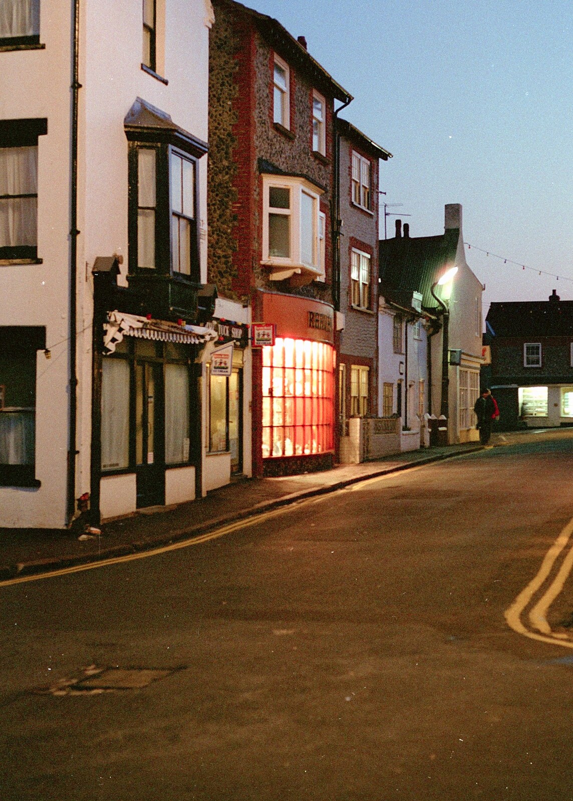 A Visit to Sheringham, North Norfolk - 20th November 1987: A warm glow spills out from a shop front