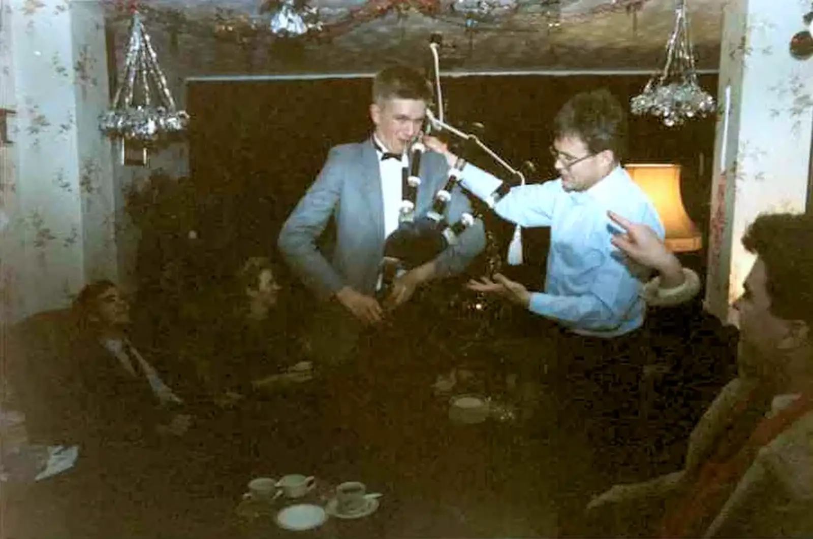 Nosher has a go on the bagpipes, from Hamish's 21st and Christmas, New Milton and Bransgore - 25th December 1987