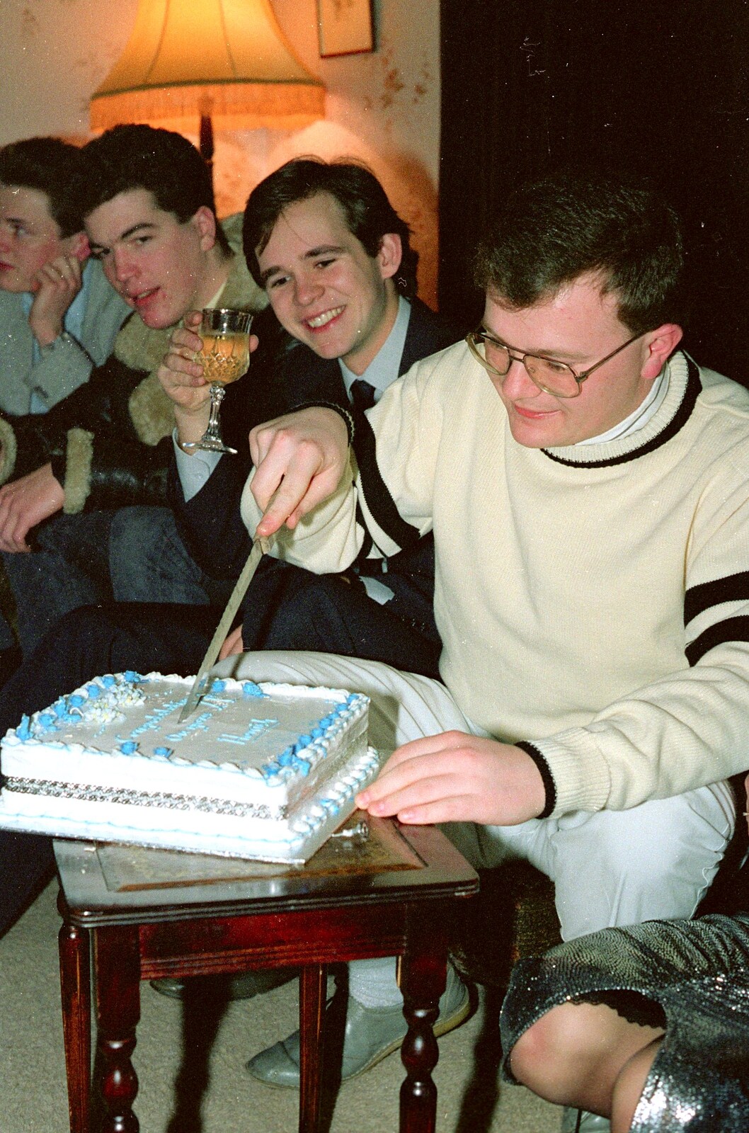 Hamish cuts the cake from Hamish's 21st and Christmas, New Milton and Bransgore - 25th December 1987