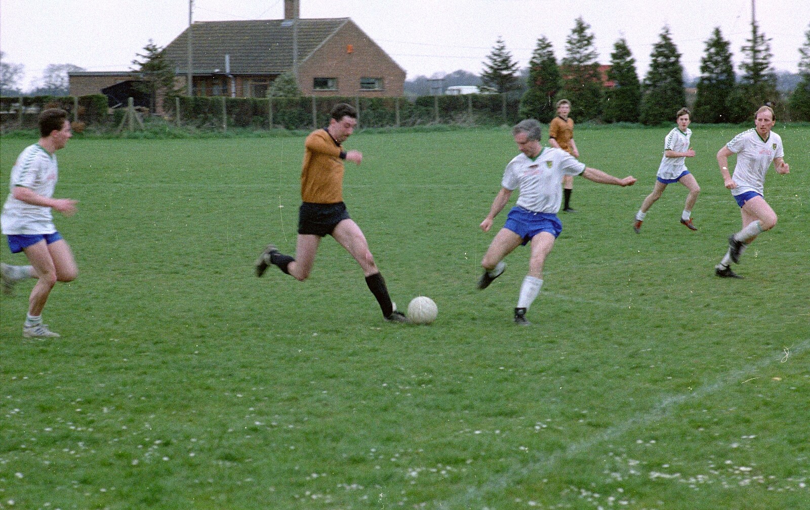 'Wideboy' Molloy's on the ball from Soman-Wherry Footie Action, Norfolk - 25th February 1988