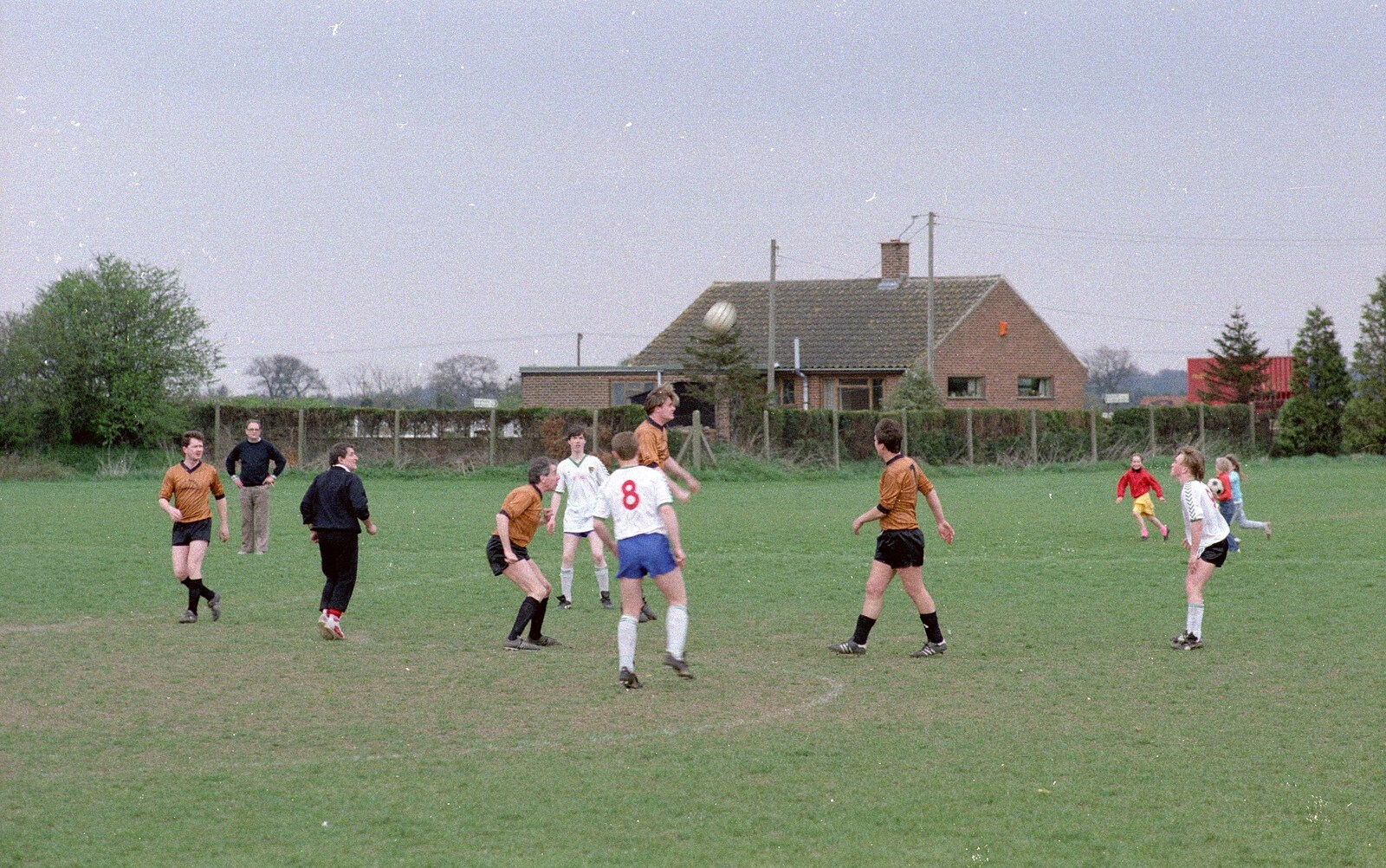 Simon 'Burton' Berry comes in for a header from Soman-Wherry Footie Action, Norfolk - 25th February 1988