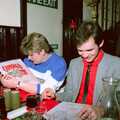 Anna and Phil scope the menu, Bransgore Barbeque and Soman-Wherry Drinks, Dorset and Norwich - 2nd April 1988