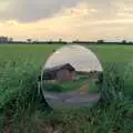 A mirror reflects the buildings opposite, Sewell's Cottage Garden Telly, Red House, Norfolk - 14th May 1988