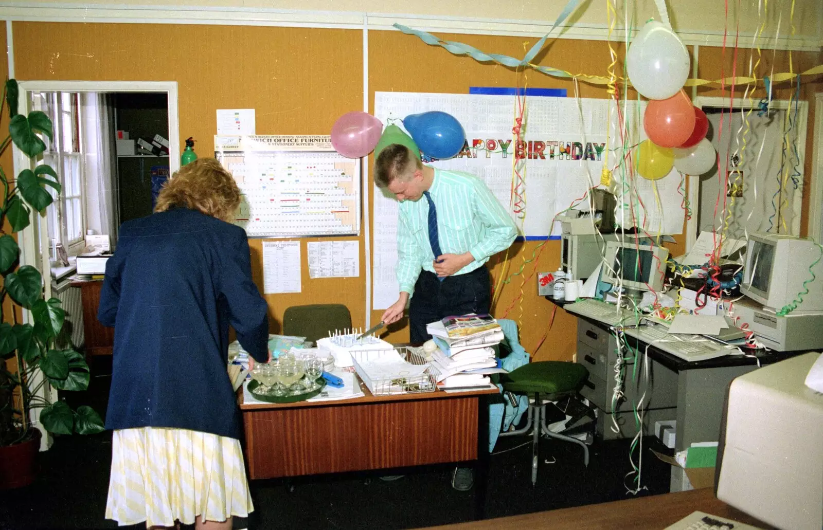 Nosher slices cake, from Somans: Nosher's 21st Birthday at the Soman-Wherry Press, Norwich, Norfolk - 26th May 1988