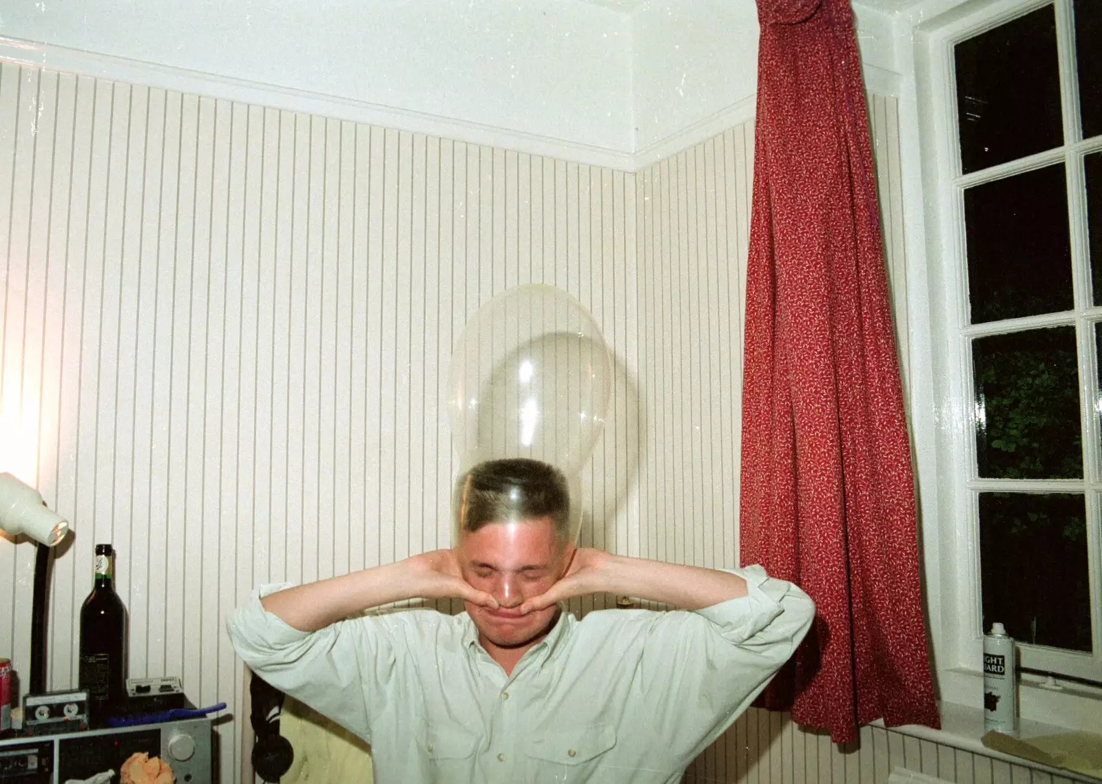 Nosher sticks a condom on his head, from Somans: Nosher's 21st Birthday at the Soman-Wherry Press, Norwich, Norfolk - 26th May 1988