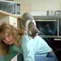 Over in Salhouse, A cat climbs all over Emma, Gus, the Sewell's Cottage Rabbit, Red House, Norfolk - 27th June 1988