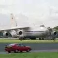 An Audi Quattro roars past the huge Antonov, Visiting Sean and Farnborough Airshow, Hampshire - 15th July 1988