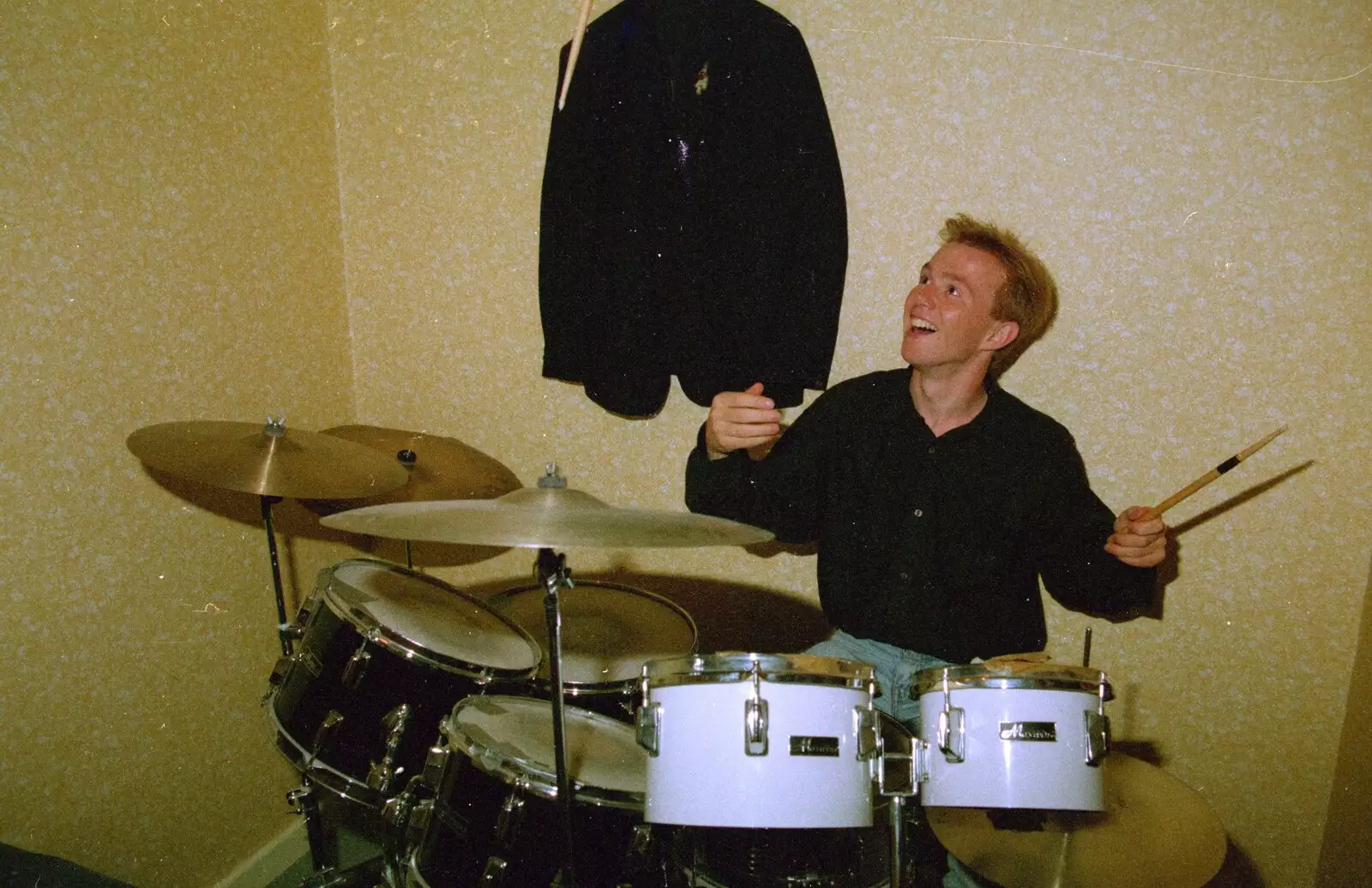 Martin throws his drum stick in the air, from Soman-Wherry and a Drumkit, Norwich and Red House, Norfolk - 22nd July 1988