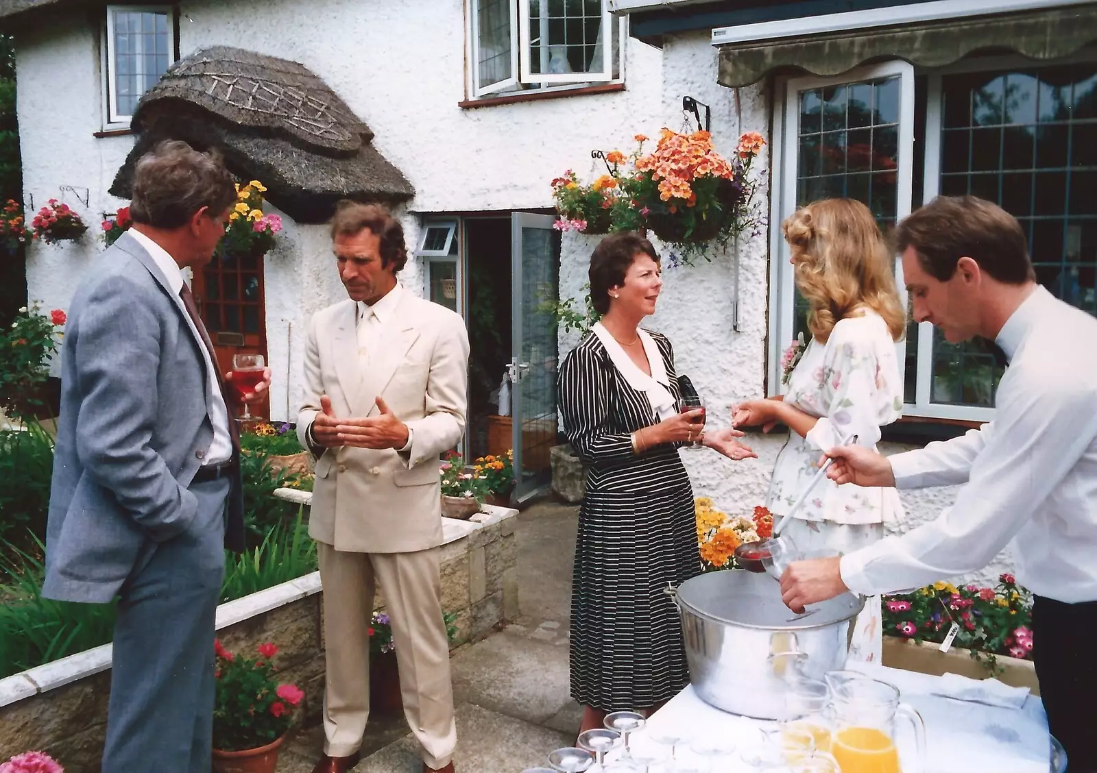 Kir Royale is served as Mother and Mike chat, from Mother and Mike's Wedding Reception, Bransgore, Dorset - 20th August 1988