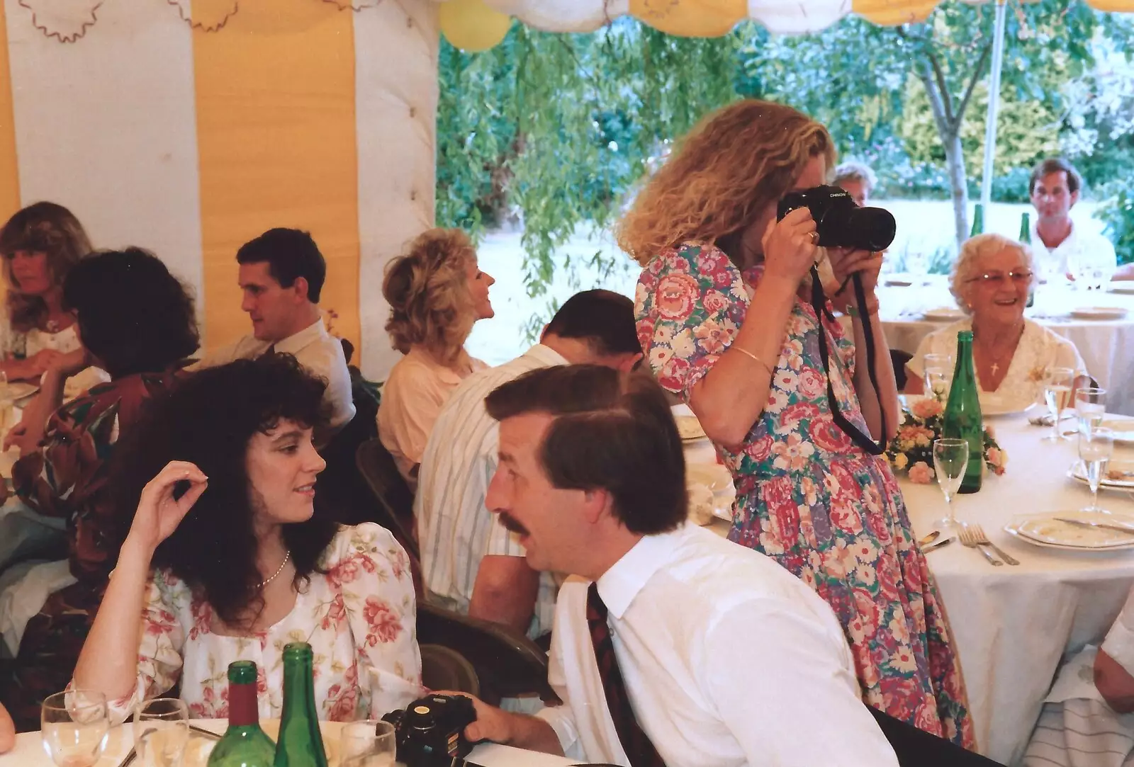 Kim takes a photo, from Mother and Mike's Wedding Reception, Bransgore, Dorset - 20th August 1988