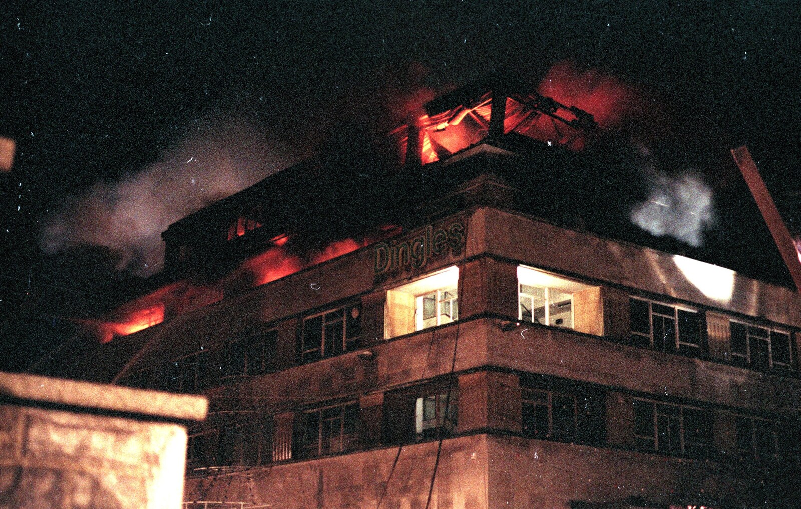 The smouldering roof of Dingles from Uni: The Fire-Bombing of Dingles, Plymouth, Devon - 19th December 1988