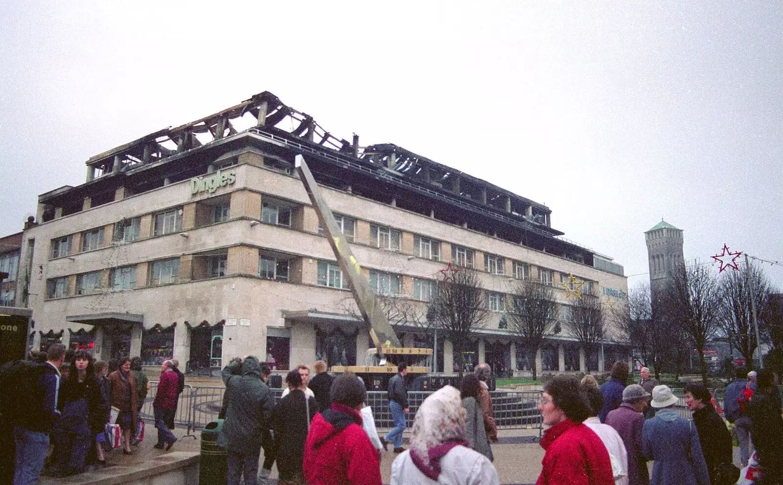 Crowds mill around and discuss the damage, from Uni: The Fire-Bombing of Dingles, Plymouth, Devon - 19th December 1988