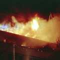 Hot blue flames burst out of the top floor of Dingles, Uni: The Fire-Bombing of Dingles, Plymouth, Devon - 19th December 1988