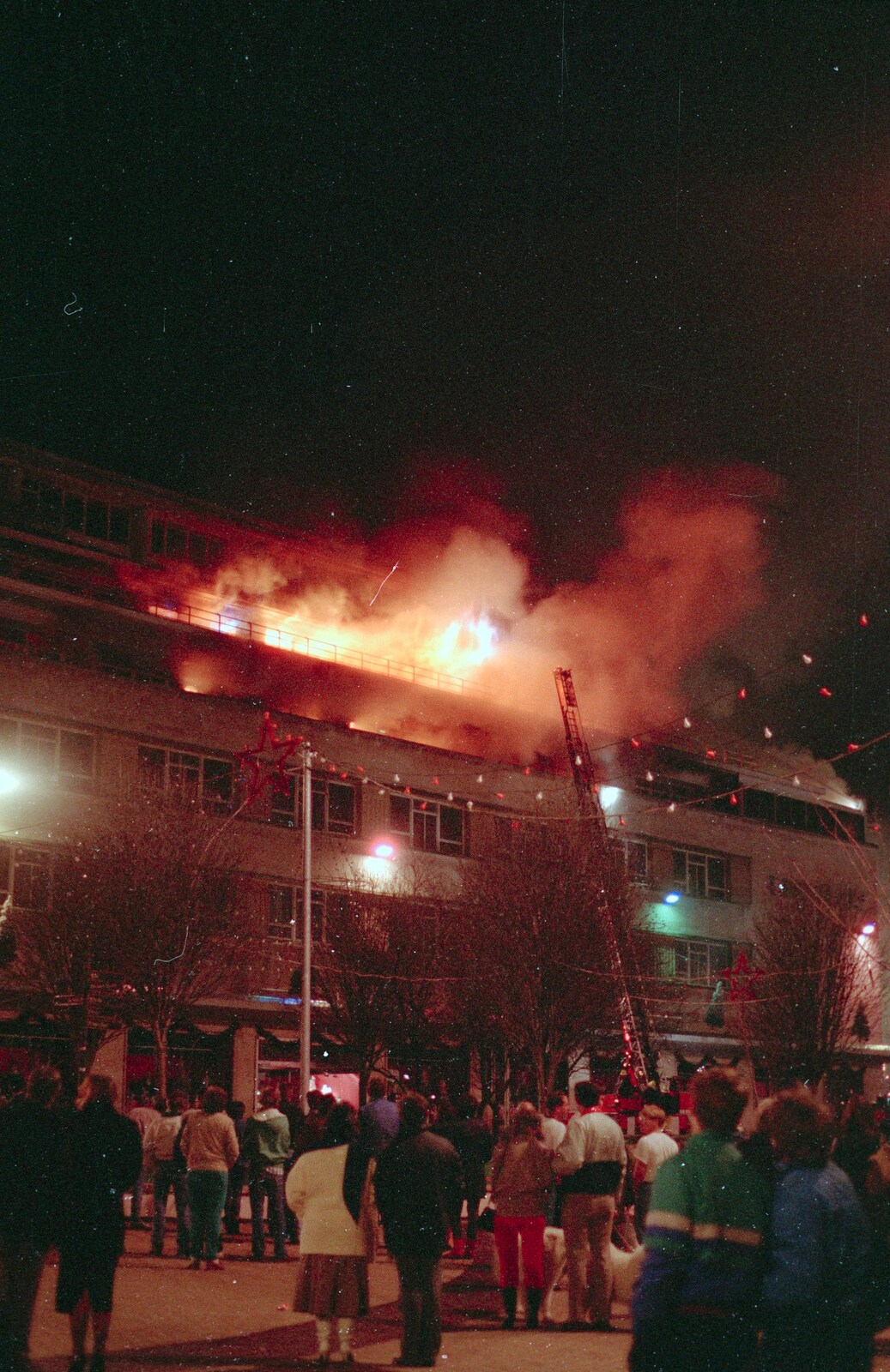 The fire spreads from Uni: The Fire-Bombing of Dingles, Plymouth, Devon - 19th December 1988