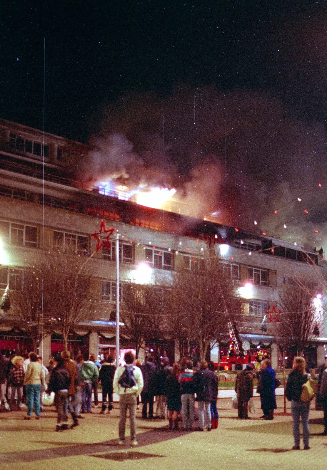 The crowds hang around, from Uni: The Fire-Bombing of Dingles, Plymouth, Devon - 19th December 1988