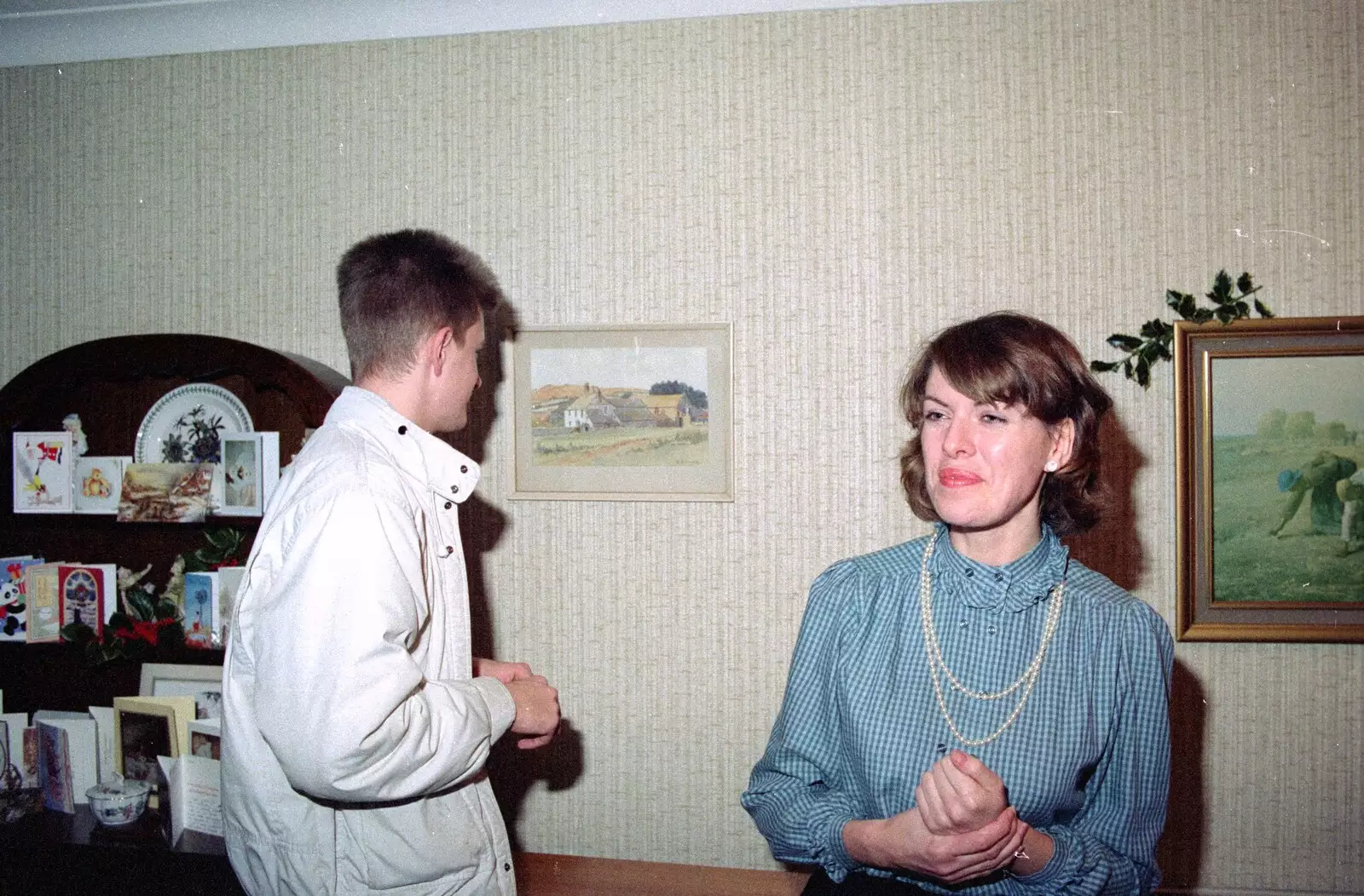 Nosher looks at a picture, from Uni: A Dinner Party, Harbertonford and Buckfastleigh, Devon - 24th December 1988