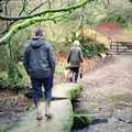 Bill crosses a stream via a stone bridge, Christmas at Pitt Farm, Harbertonford, Devon - 25th December 1988