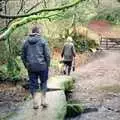 Bill crosses a stream via a stone bridge, Christmas at Pitt Farm, Harbertonford, Devon - 25th December 1988