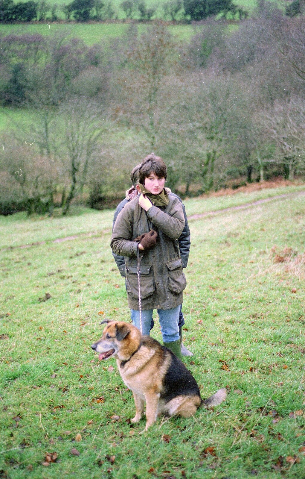 Bill hides behind Angela from Christmas at Pitt Farm, Harbertonford, Devon - 25th December 1988