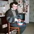 Hamish and a box of Quality Street, New Year's Eve at Hamish's, New Milton, Hampshire - 31st December 1988