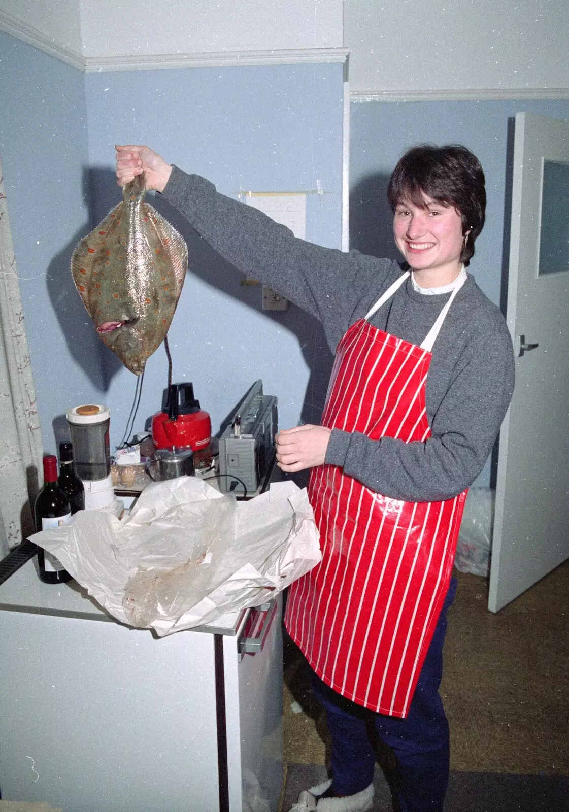 Angela and a massive fish (a plaice, as it happens), from Uni: A Trip To Glasgow and Edinburgh, Scotland - 15th May 1989