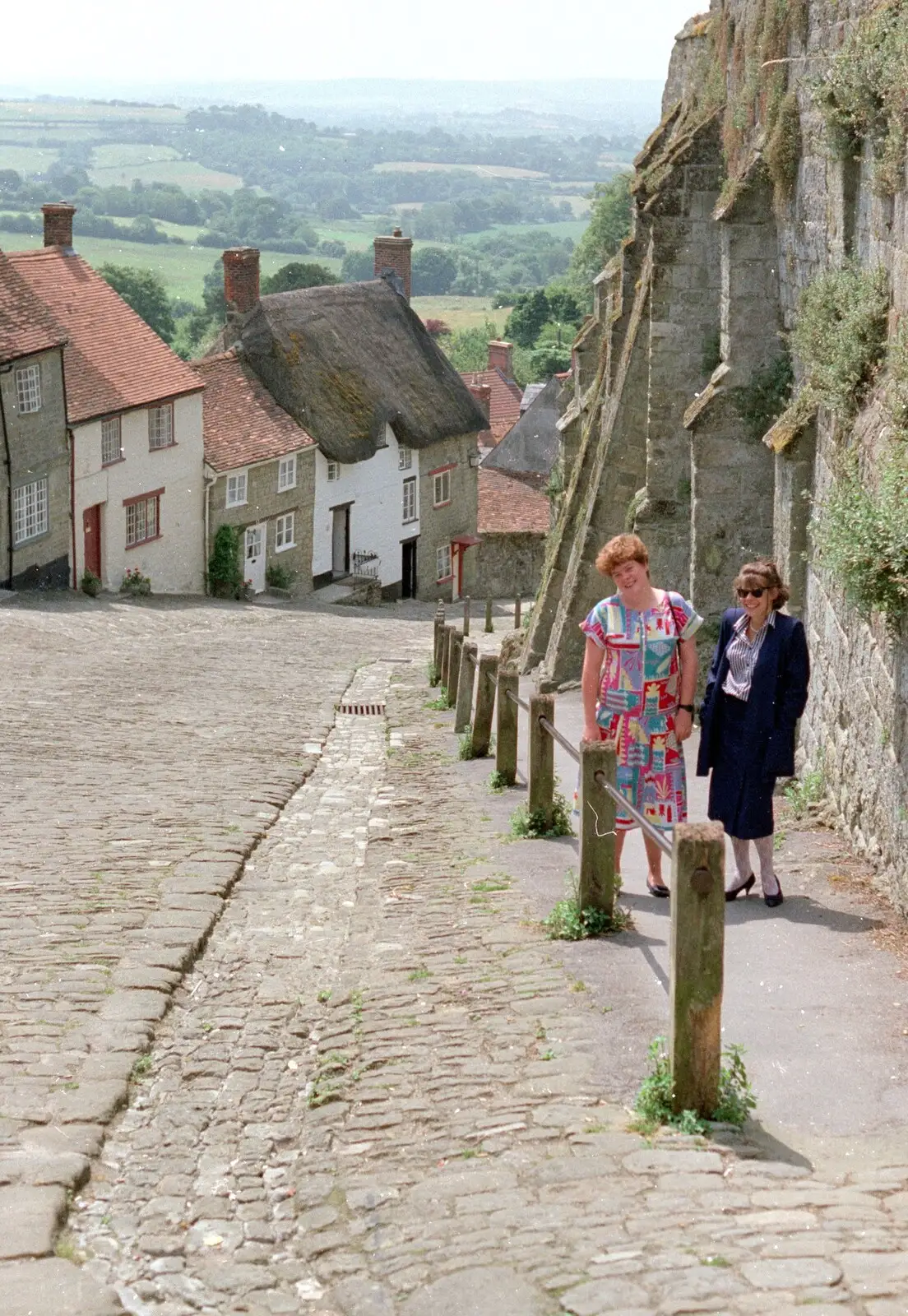 Kate and Michelle on Gold Hill, from Uni: A Trip to Yeovil, Shaftesbury, and the Tamar Bridge - 28th May 1989