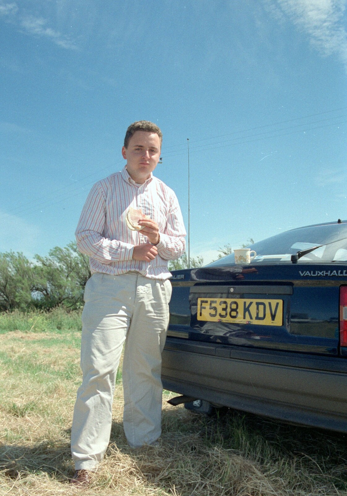 Andy stands next to his hired Mark 2 Vauxhall Cavalier from Uni: An End-of-it-all Trip to Land's End, Cornwall - 13th June 1989