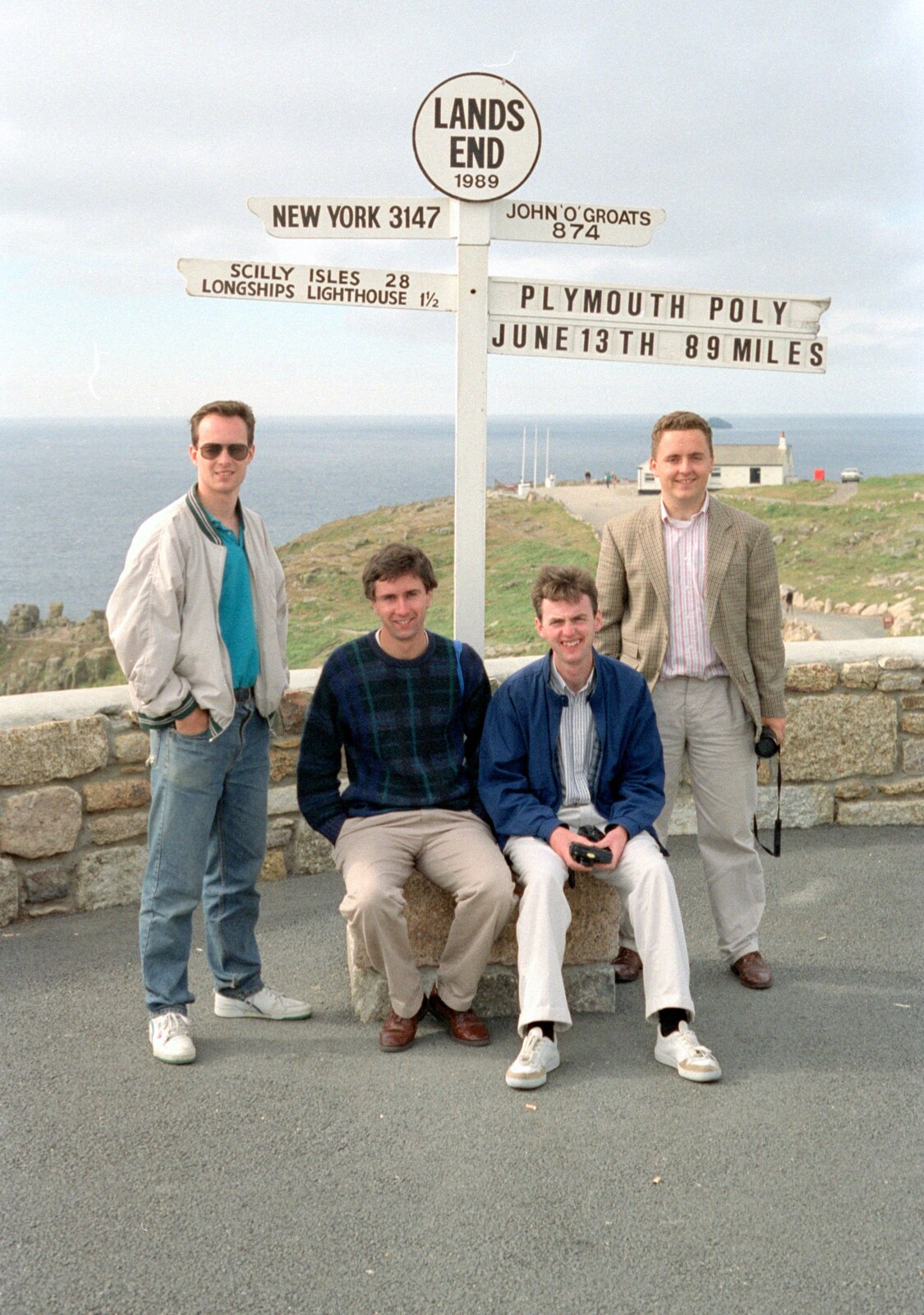 The lads at the Land's End sign from Uni: An End-of-it-all Trip to Land's End, Cornwall - 13th June 1989