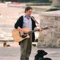 A busker plays guitar as his dog waits, Uni: An End-of-it-all Trip to Land's End, Cornwall - 13th June 1989