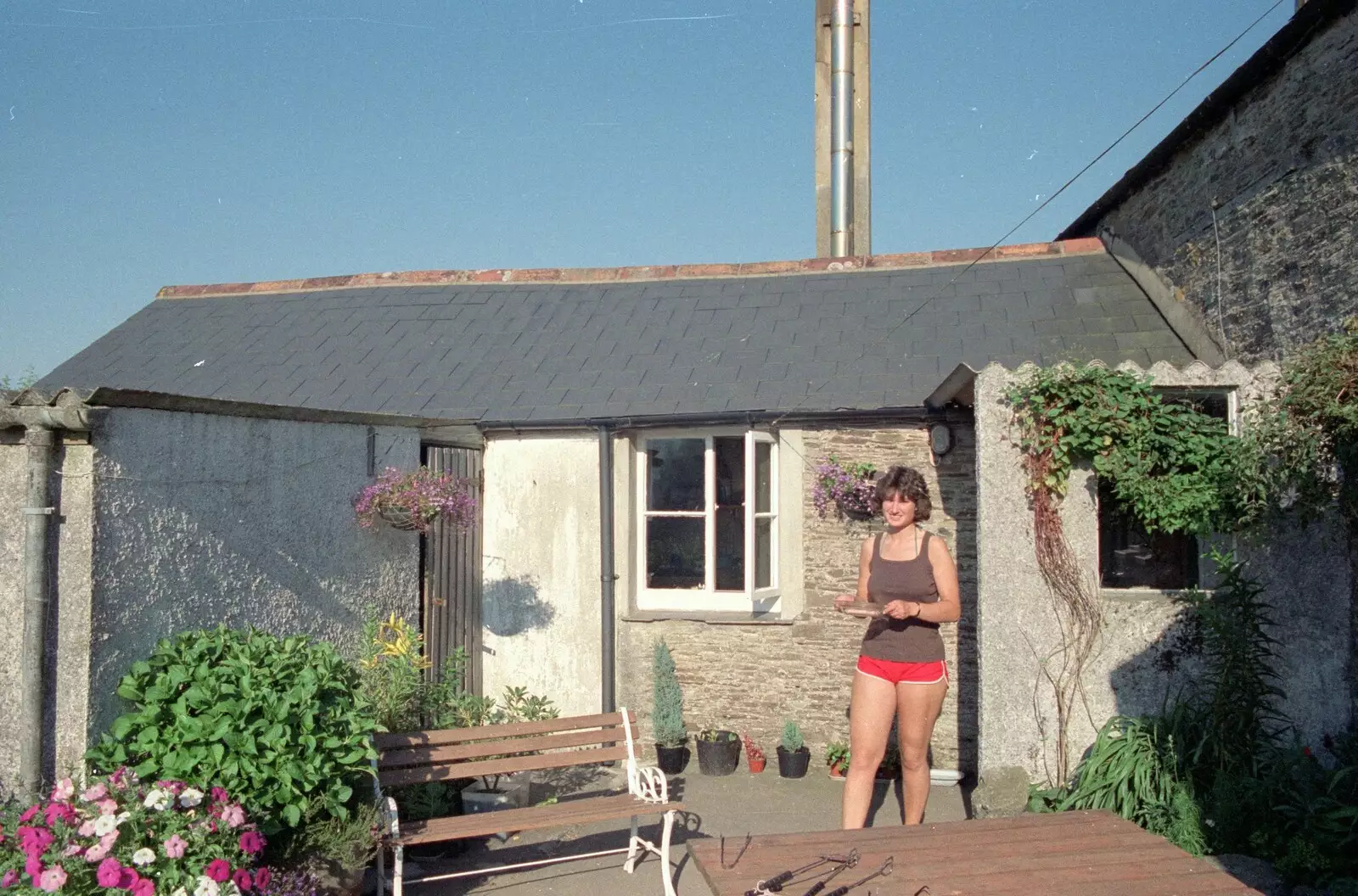 Angela brings out a plate of something, from Uni: A Trip to the Riviera and Oberon Gets New Shoes, Torquay and Harbertonford, Devon - 3rd July 1989